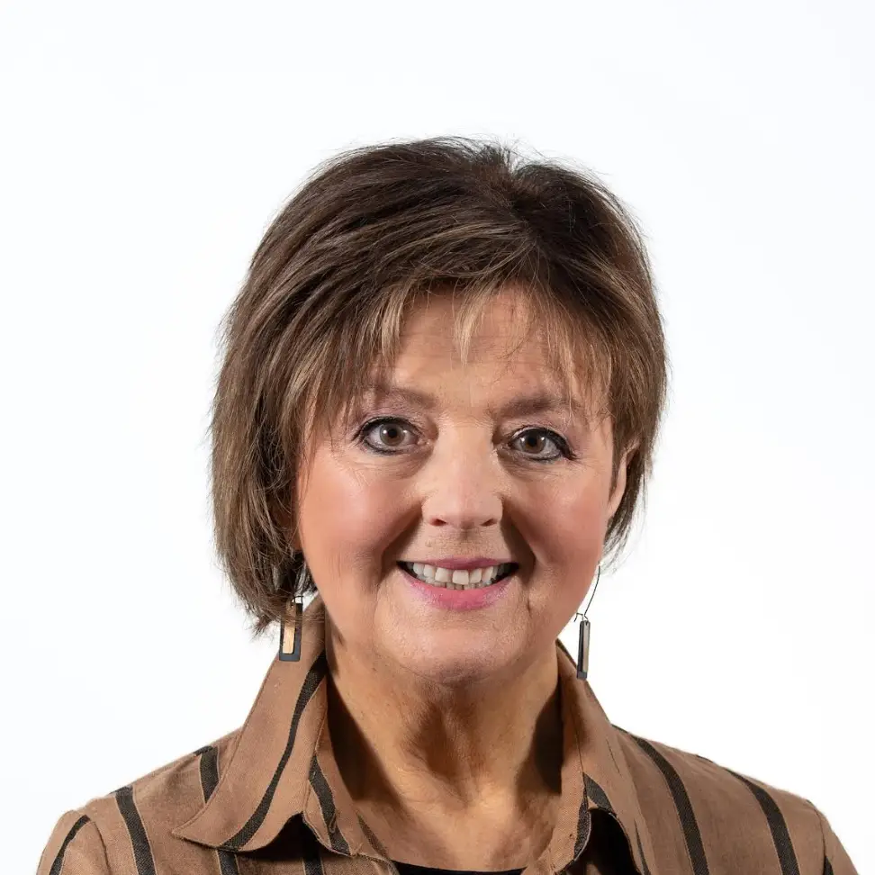 a woman smiling for a picture