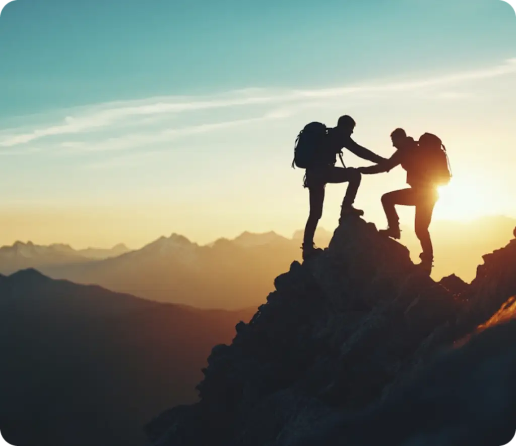 a group of people climbing a mountain